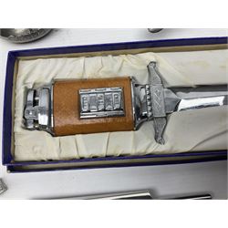 Pair of silver plated duck figures, together with other novelty silver plated items including aubergine needle case, longship salt, cricket bat corkscrew, dagger desk compendium etc, 