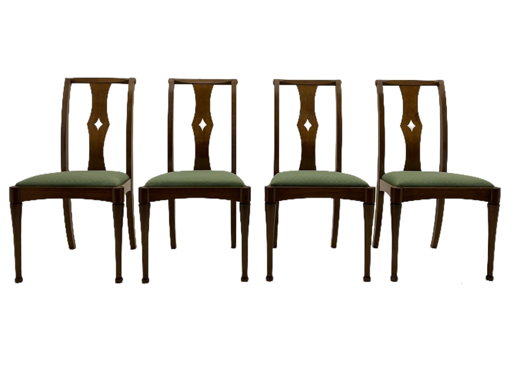 Set of eight contemporary walnut dining chairs, curved backs set with shaped splats with pierced detail, drop in upholstered seat cushions, on turned supports 