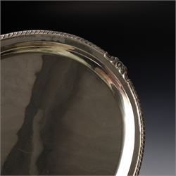 Silver oval tray with gadrooned and floral moulded border W36cm, marked Silver but tests as 800 standard