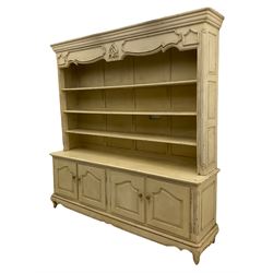 Large French style cream painted dresser, fitted with four cupboards and three tier plate rack
