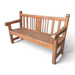 20th century teak cricket bench featuring a central splat with moulded cricket bat and bal...