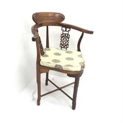 Chinese rosewood corner chair, carved and pierced splats, shaped seat, square supports joined by stretchers, W70cm