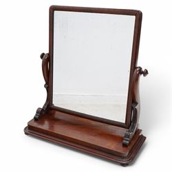 Victorian mahogany swing mirror, rectangular bevelled plate in moulded frame, on carved sc...
