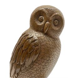 Acornman - carved oak owl perched on branch, on tooled block plinth carved with acorn signature, by the workshop of Alan Grainger, Brandsby (carved by Norman Darnley)