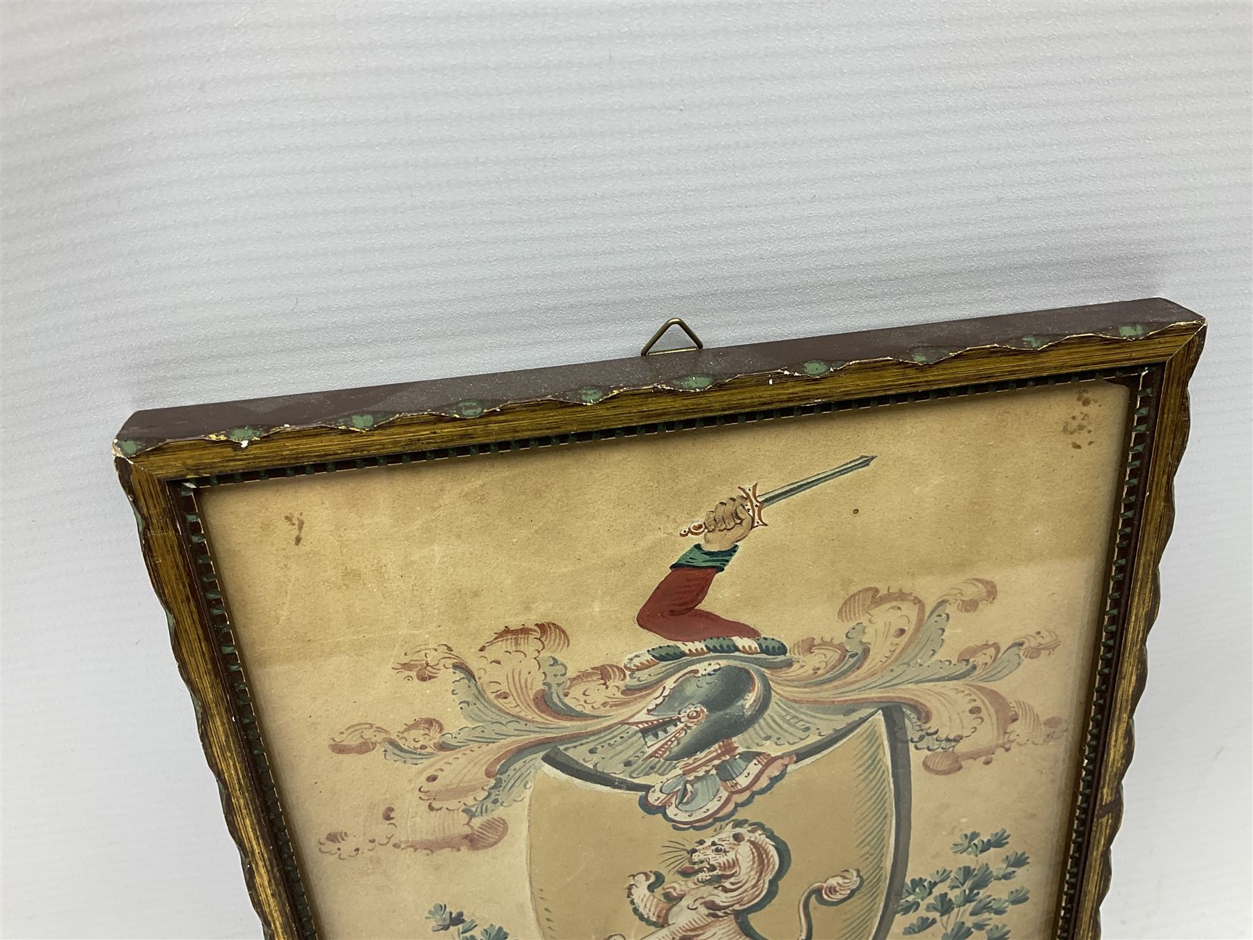 19th century heraldic watercolour depicting 'The Salor's Arms', lion rampant within a shield beneath a knight's helmet, embellished with floral and scrolling decoration, inscribed with family motto 'Fortis et Fidelis' (Strong and Faithful) 