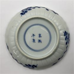 18th century Chinese blue and white Kangxi teacup and saucer, decorated with dancing figures, four character Kangxi mark beneath, saucer D10cm