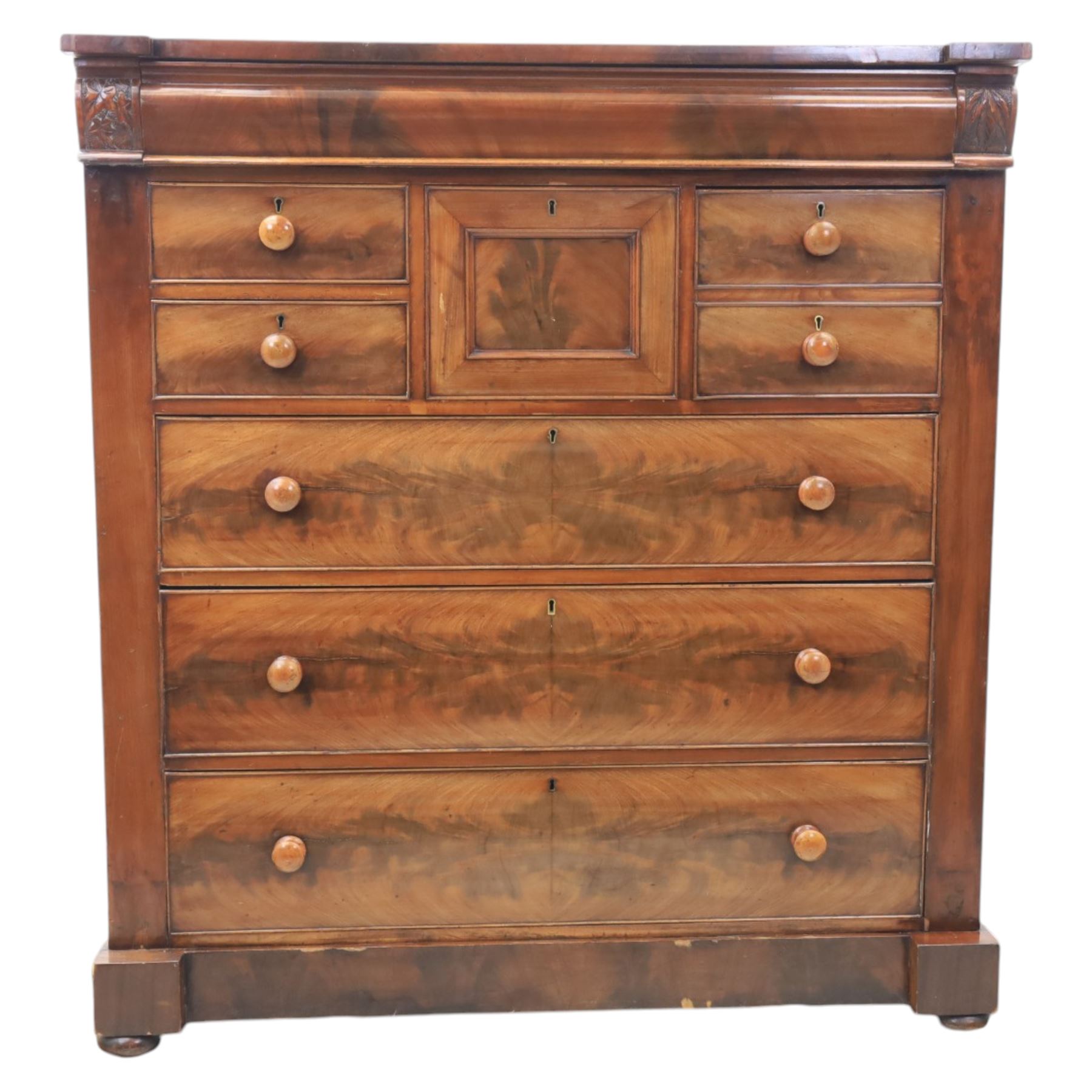 Victorian Scottish mahogany chest, cushion drawer over assorted small drawers and three long drawers, all with flame veneered fronts, turned wooden handles