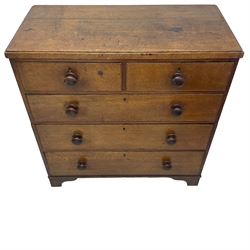 19th century oak chest, fitted with two short and three long drawers, turned wooden handles, on bracket feet