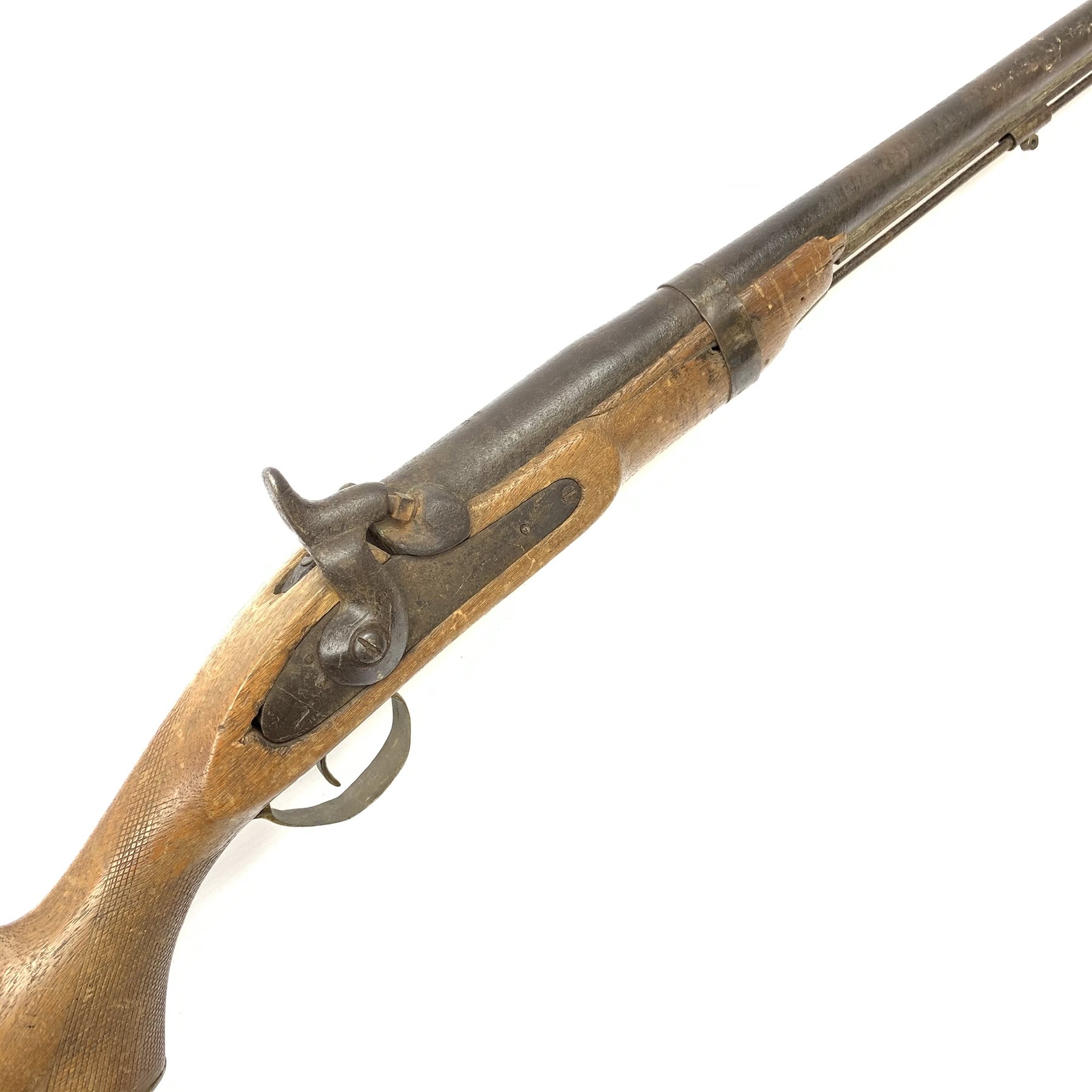 Indian ornamental percussion cap muzzle loading musket with walnut stock, chequered pistol grip, brass fittings and under barrel ramrod L112cm overall