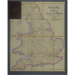  19th century folding Tuck's Map of the Railways of England and Wales, mounted on linen 72 x 58cm, bound in brown cloth with folding Tuck's Railway Compendium  