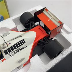 Ayrton Senna Racing Car Collection - McLaren MP4/4 1988 World Champion; boxed; with separate stand titled 'First Championship'