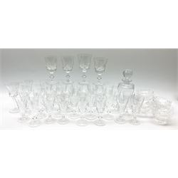 Cut glass to include Edinburgh crystal, straight sided decanter with stopper, drinking glasses of various forms and nine footed bowls.
