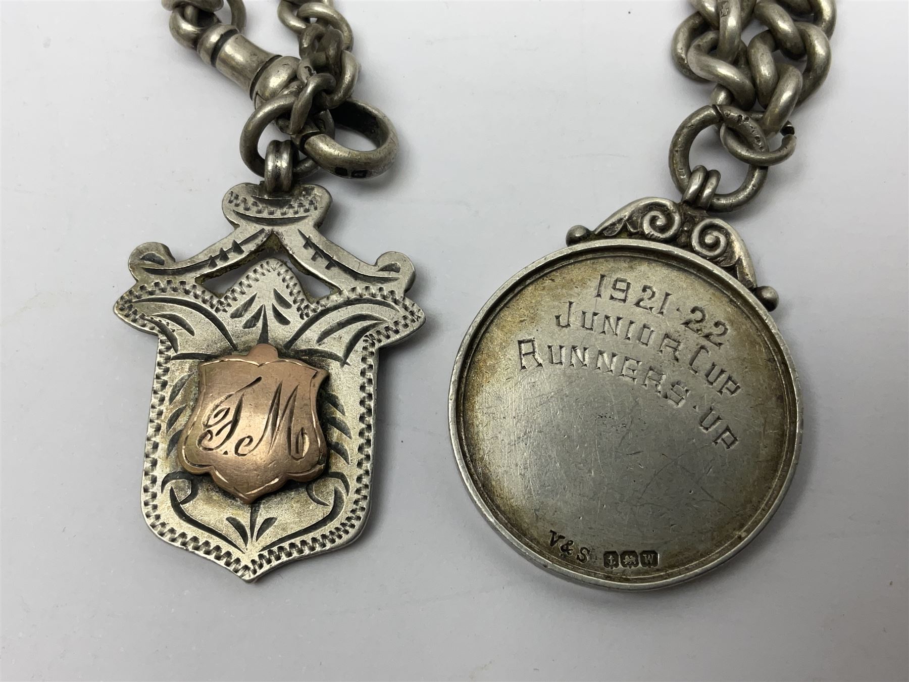 WW1 group of three medals comprising 1914-15 Star awarded to L-Cpl. W.J. Horspool R.War.R., British War Medal and Victory Medal awarded to A. Cpl. W.J. Horspool R.War.R.; WW1 British War Medal awarded to 3-8755 W.O.Cl.2. S. Paterson North'd Fus.; and hallmarked silver and enamel Northumberland Football Association Junior Cup Runners Up fob 1921-22 on silver chain (5)