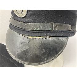 Hull City Police - helmet with king's crown night plate; two further ball-top helmets with Queen's crown plates; and a peaked cap (4)