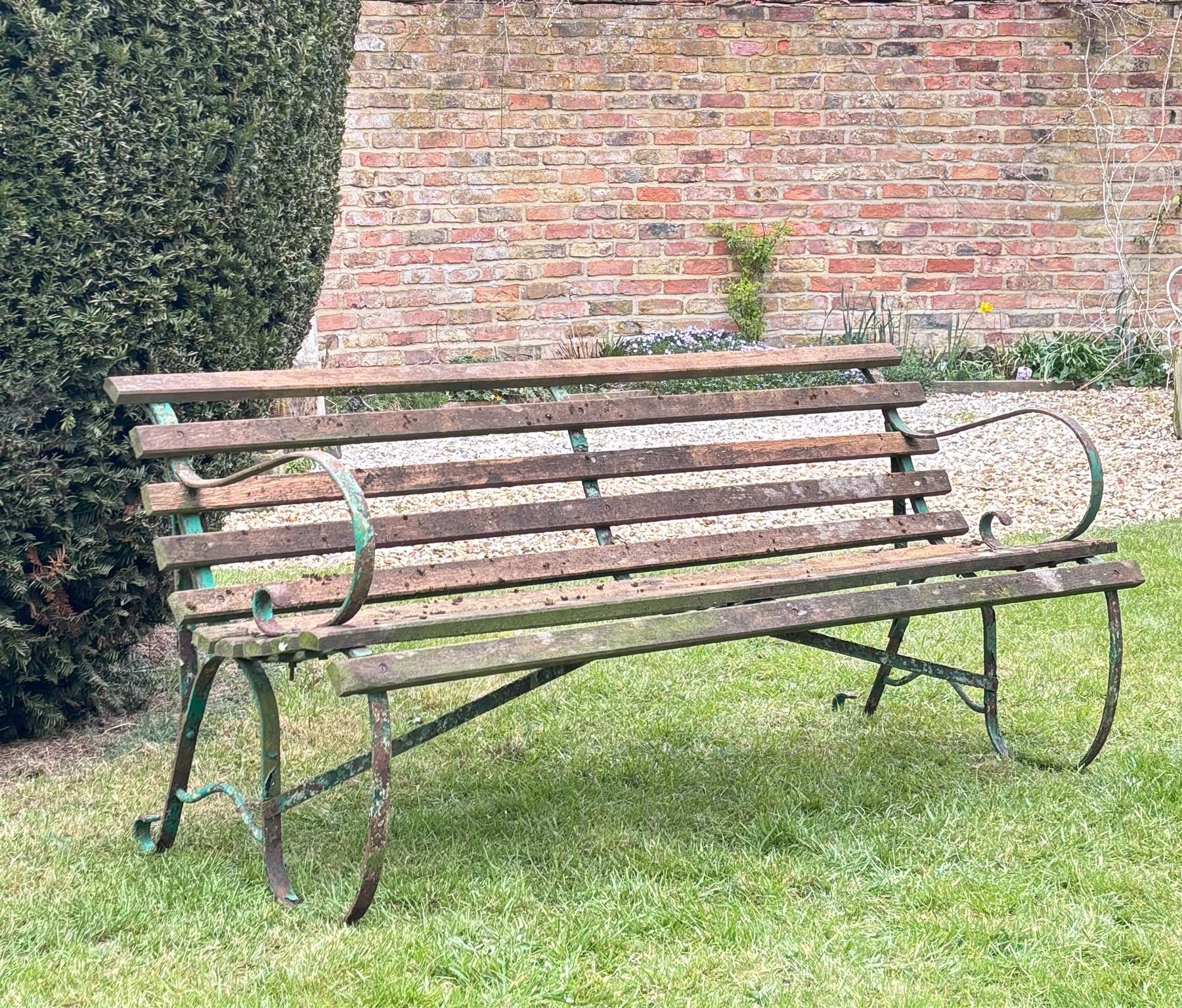 19th century scrolled wrought iron park bench with teak slatted seat and back. H76cm, L183cm, D65cm.  - COLLECTION BY APPOINTMENT FROM: The White House, Thirsk Road, Easingwold, York, YO61 3NF - CALL 01723 507111 TO ARRANGE