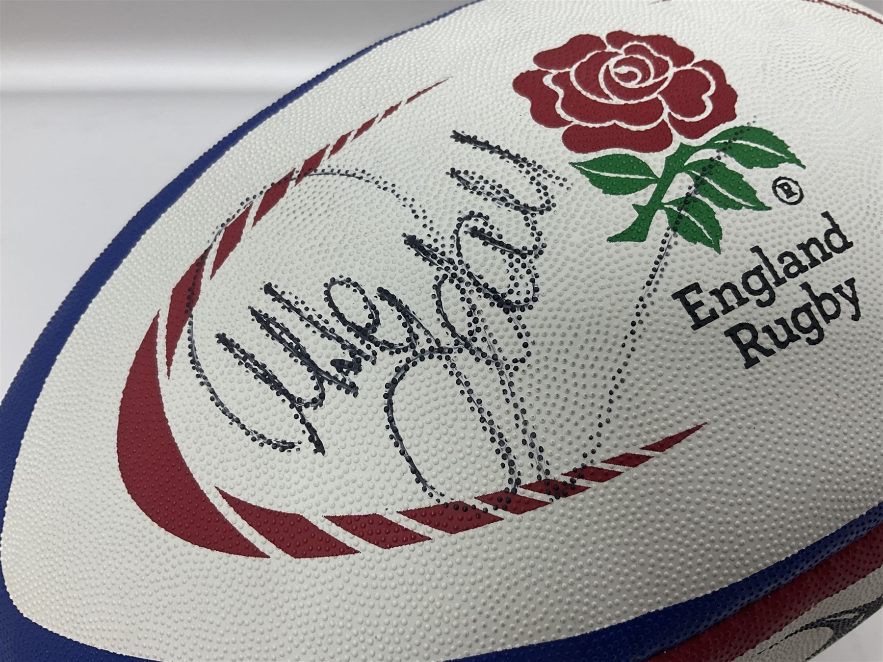England Rugby official replica ball by Gilbert signed by Mike Tindall, together with a FIFA football