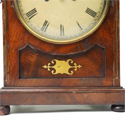 William IV mahogany and brass mounted bracket clock, the rectangular case with swept pagoda top with acanthus carved and rosette applied decoration, the sides with circular pierced brass fabric covered apertures and brass carrying handles, dial with 8 inch painted Roman chapters with pierced steel hands, the brass four pillar twin wire fusee 8-day movement with anchor escapement striking on a bell, lacking pendulum 