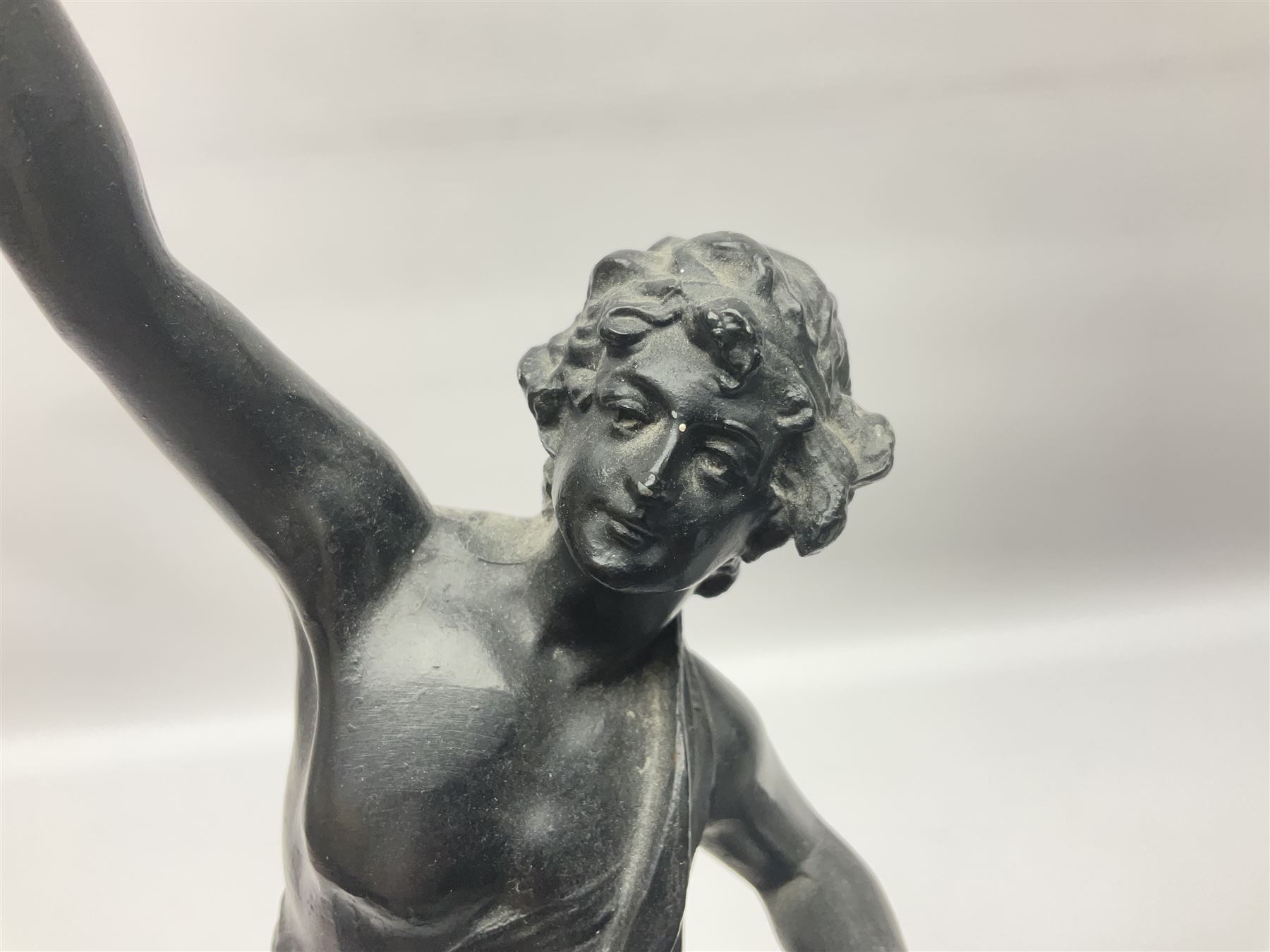 Pair of spelter figures, Le Force and Le Pouvoir, modeled as figures standing on lions, arms held aloft, H51cm 