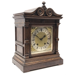  Late 19th century oak mantel clock by Lenzkirch, architectural case with scroll carved top, fluted columns and panelled sides, square brass dial with silvered Roman chapter, twin train movement stamped Lenzkirch 52 902889 Ting-Tang striking the quarters on two gongs, H39cm, W28cm, D18.5cm  