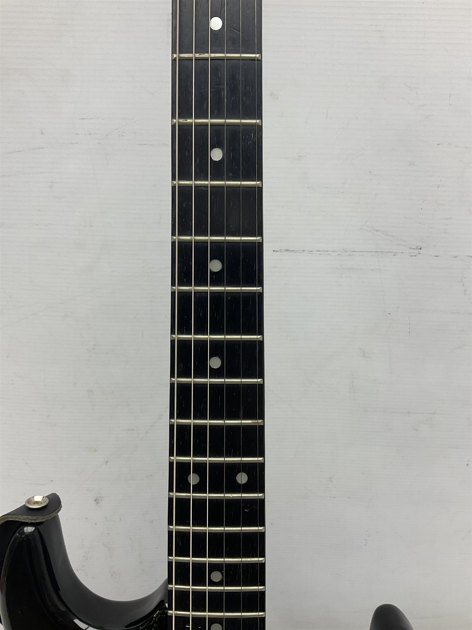 Encore black electric cut-away guitar L96cm; and Spanish Victor Garcia model 187 acoustic guitar, bears label dated 1972 L99cm; each in soft carrying case (2)