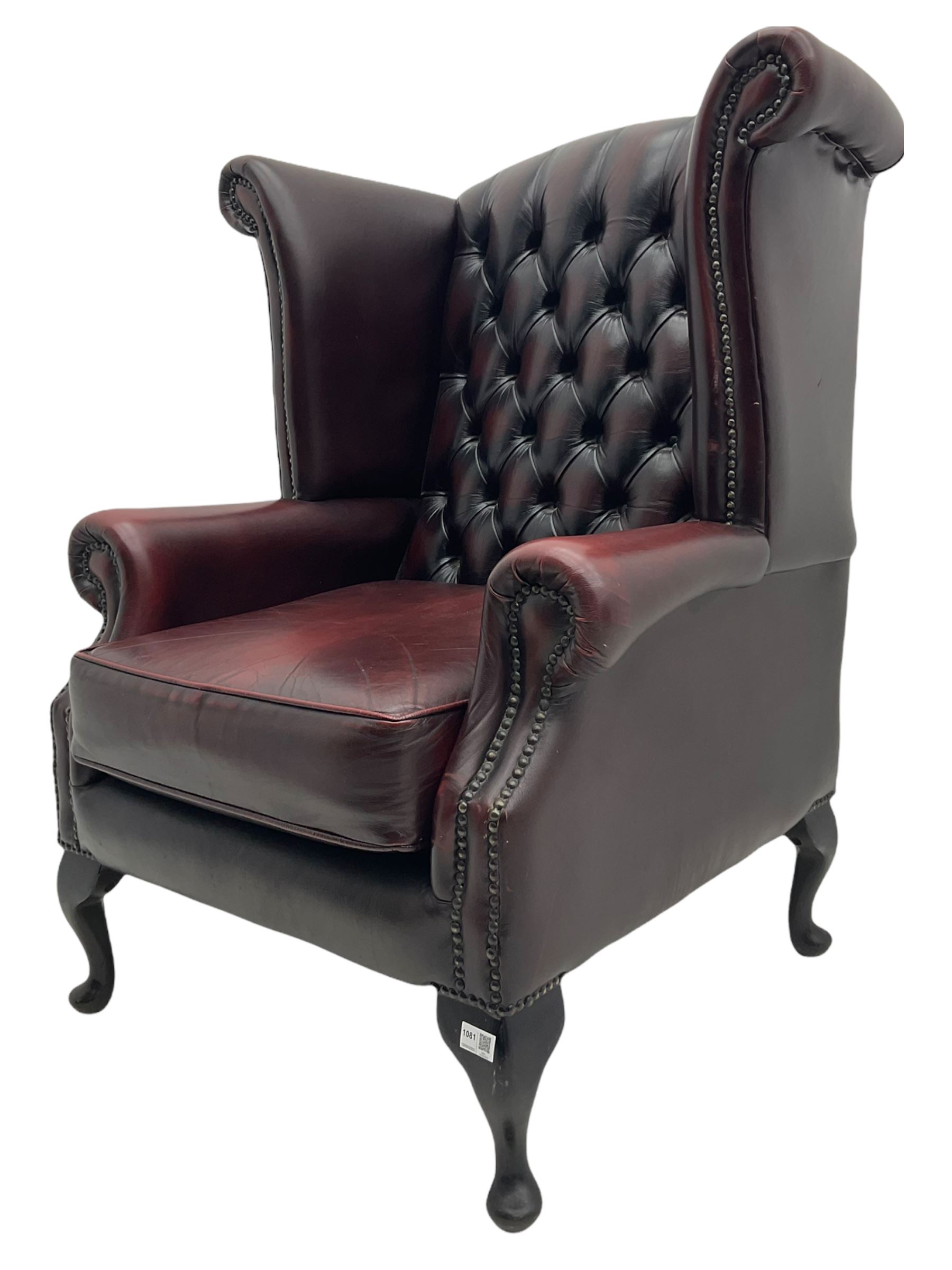 Thomas Lloyd - Georgian style wing back armchair, upholstered in buttoned oxblood leather
