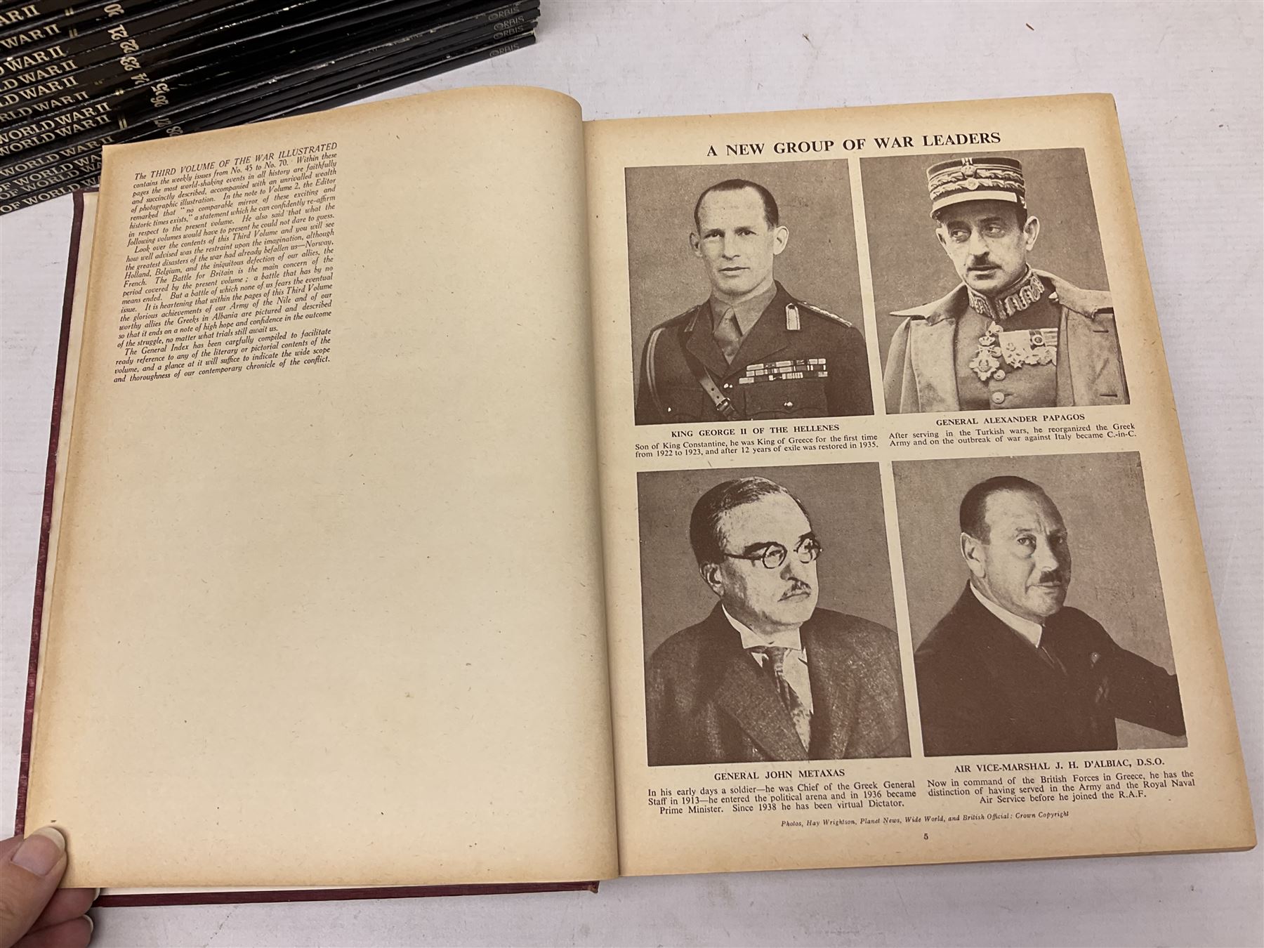 Three boxes of books, periodicals and DVDs of military interest with particular emphasis on WW2 including The History of World War Two in thirty original parts by Orbis, The D-Day Experience by Richard Holmes, The World War Two Databook, The World at War, Special Forces etc