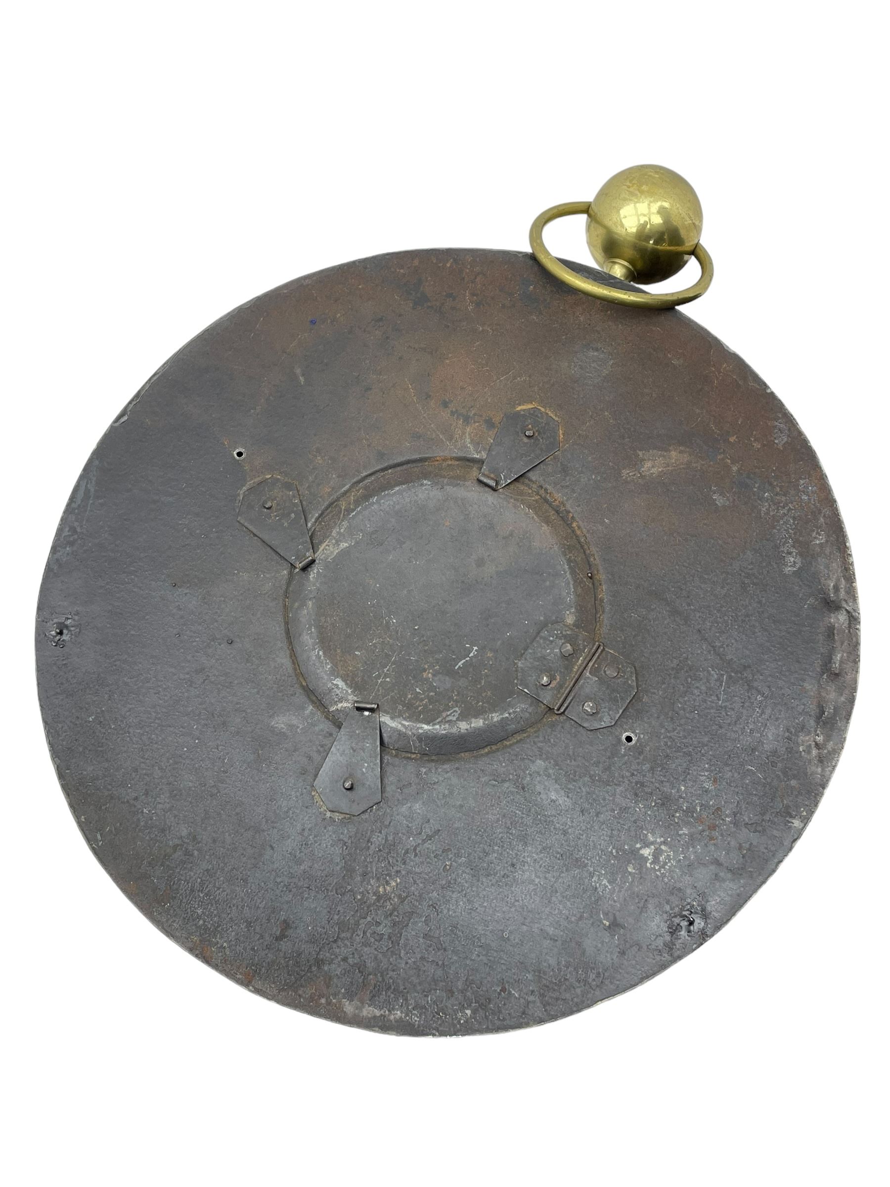 Honore Pons of Paris -  A good and early 19th century Tole Ware wall clock c1830, with a later re-decorated case suspended from a circular brass hanger, cast brass dial bezel and silvered engine turned dial with roman numerals, minute track and steel moon hands, 8-day twin train countwheel striking movement with a silk suspension, striking the hours and half hours on a bell. With pendulum and key.
