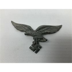 Five WW2 German peaked cap badges, four with double-pinned backs