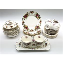 A group of Royal Albert tea wares, to include six teacups and six saucers, six side plates, and eight bowls decorated in the Lavender Rose pattern, five bowls decorated in the Cottage Garden pattern, and five desert plates and a small lidded pot decorated in the Old Country Roses pattern, plus a New Chelsea Staffs sandwich plate. 