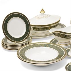 Royal Doulton Vanborough pattern part dinner service, comprising two covered vegetable dishes, open vegetable dish, eight dinner plates, oval serving dish, six soup bowls and two further bowls, eight side plates and eight dessert plates, six coffee cans and saucers, milk jug and a gravy boat and stand