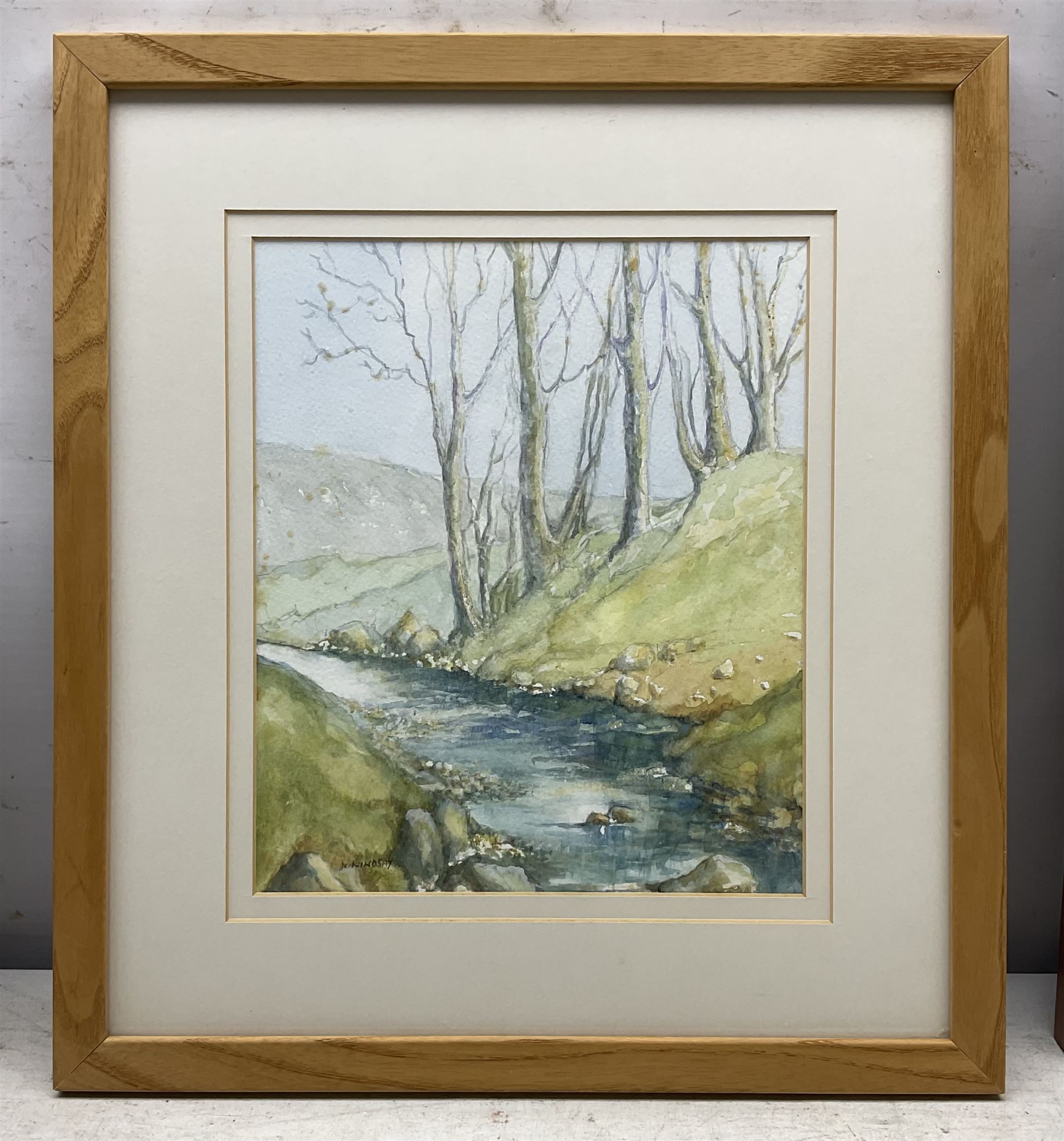 Norma Lindsay (Northern British 20th Century): Whitby Woodland Scenes, three watercolours signed max 33cm x 23cm; Sue Morton (British 20th Century): 'Featherbed Lane - Aislaby', watercolour signed, titled verso 20cm x 19cm (4)