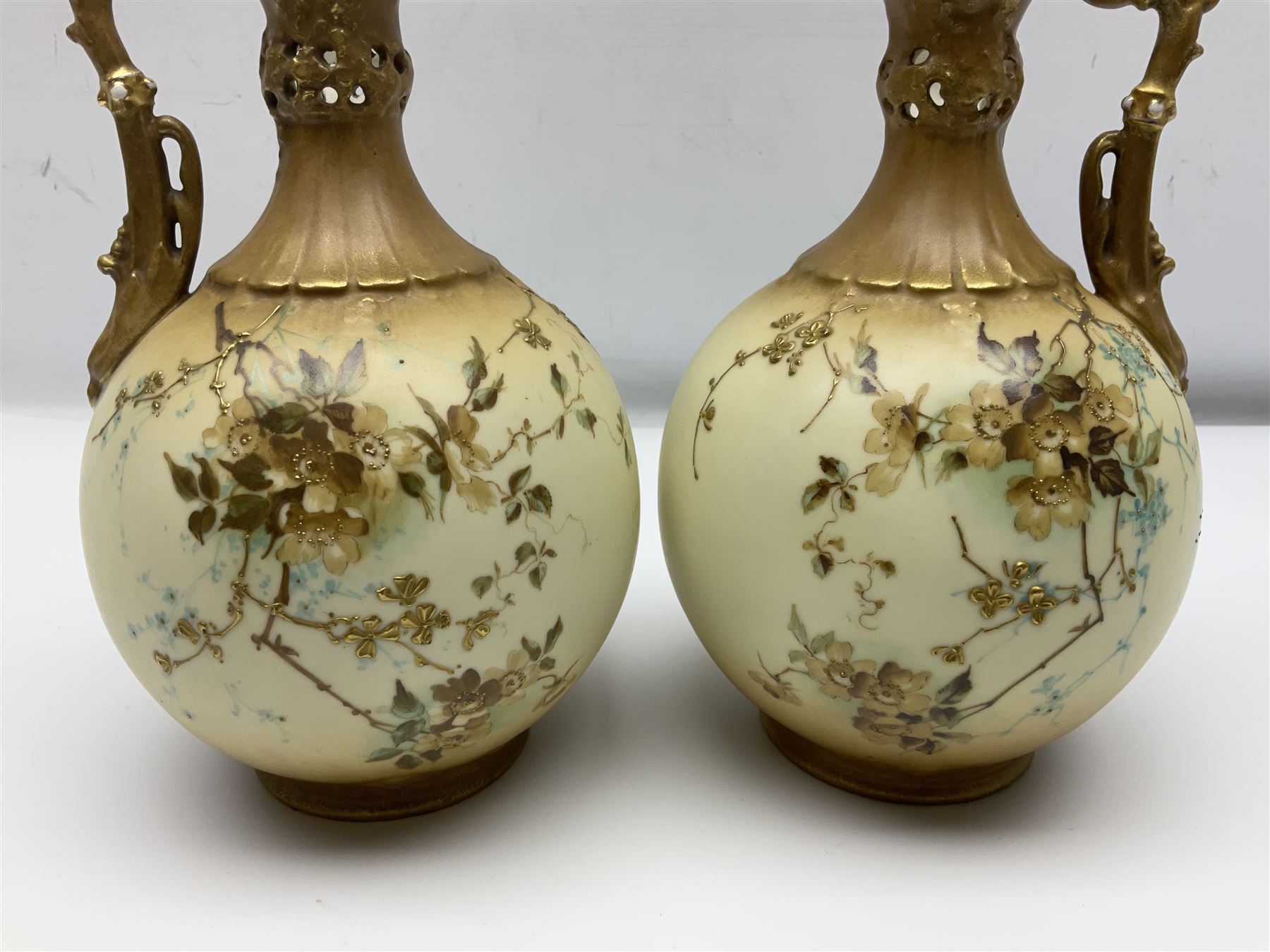 Pair of Turn Vienna blush ivory ewers decorated with floral sprays and gilt, H25cm