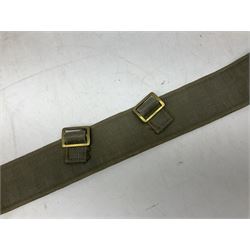 British Army Officers Sam Browne leather belt with shoulder strap; and webbing belt with Potter London Staybrite buckle for 19th Regiment of Foot (Green Howards) with various markings (2)