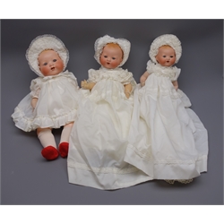  Three Armand Marseille 'My Dream Baby' bisque head dolls, each with moulded hair, sleeping eyes, open mouth with teeth and composition body with jointed limbs, one marked 'AM Germany351/5K', one marked 'AM Germany 351/31/2K' and one marked 'AM Germany 351/21/2K', largest H46cm (3)  
