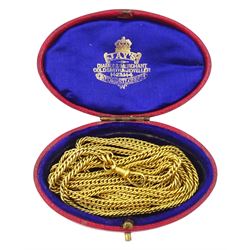 19th century gilt fancy link guard / muff chain with lobster clip, with a tooled red leather jewellery box