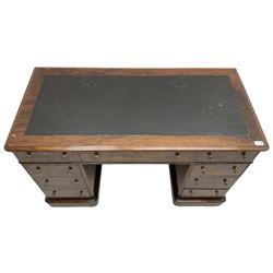 Victorian mahogany twin pedestal desk, rectangular top with inset ebonised leather writing surface, fitted with nine graduating drawers with brass pull handles, on plinth bases