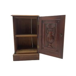 Victorian mahogany bedside cupboard, enclosed by panelled door with interior urn carving (W44cm, H74cm, D35cm), and an early 20th century painted mahogany bedside cupboard by Waring and Gillows (W39cm, H75cm, D41cm)