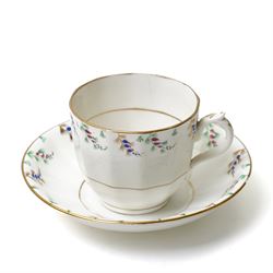 19th century English porcelain tea service, possibly Coalport, comprising teapot, covered sucrier, ten teacups and saucers, slop bowl, milk jug, and two serving dishes