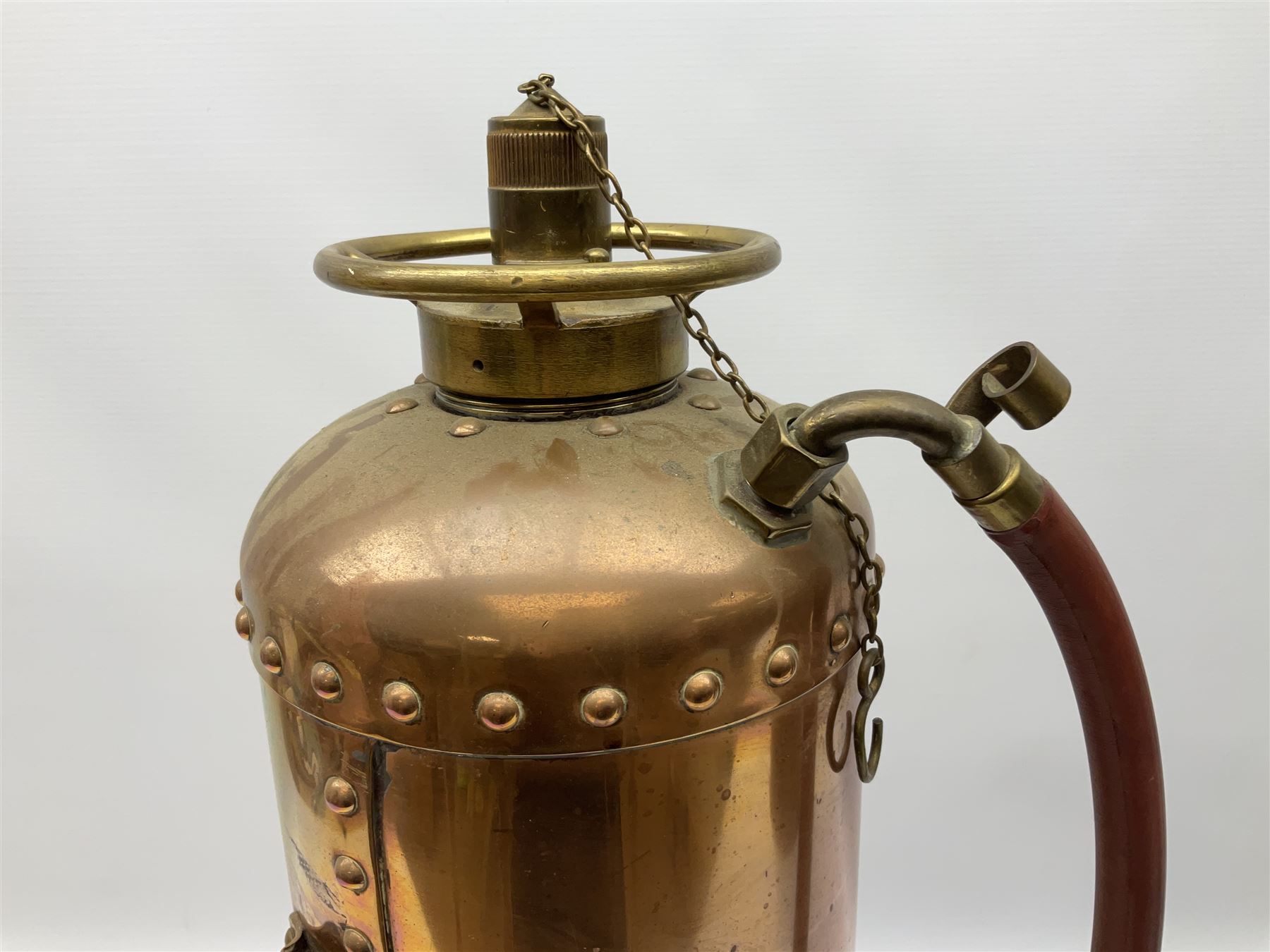 Large copper ‘Waterloo’ fire extinguisher by Read and Campbell Ltd and another Safex example 
