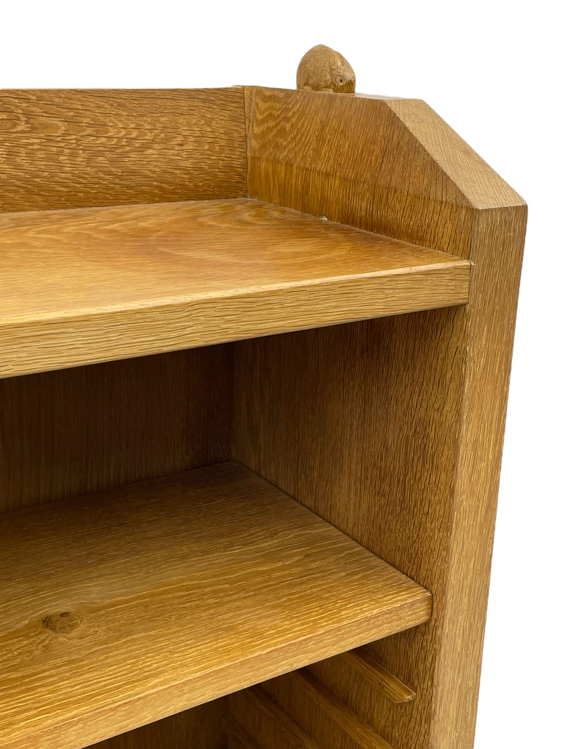 'Rabbitman' oak bookcase, fitted with three adjustable shelves, the top carved with rabbit signature, by Peter Heap of Wetwang