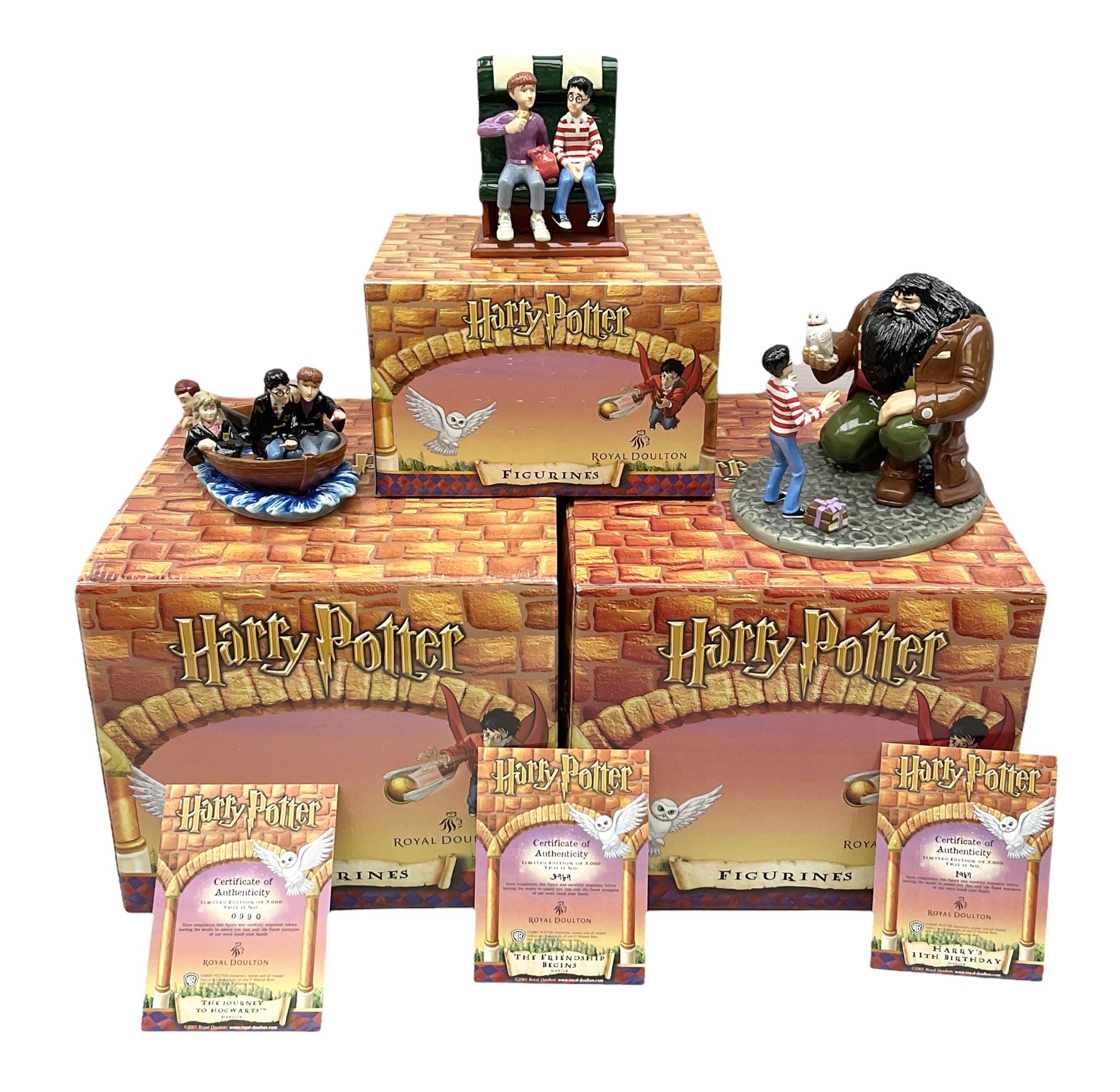 Three Royal Doulton limited edition Harry Potter groups - 'Harry's 11th Birthday' No.2967/5000; 'The Journey To Hogwarts' No.990/5000; and 'The Friendship Begins' No.3969/5000; all boxed with certificate (3)