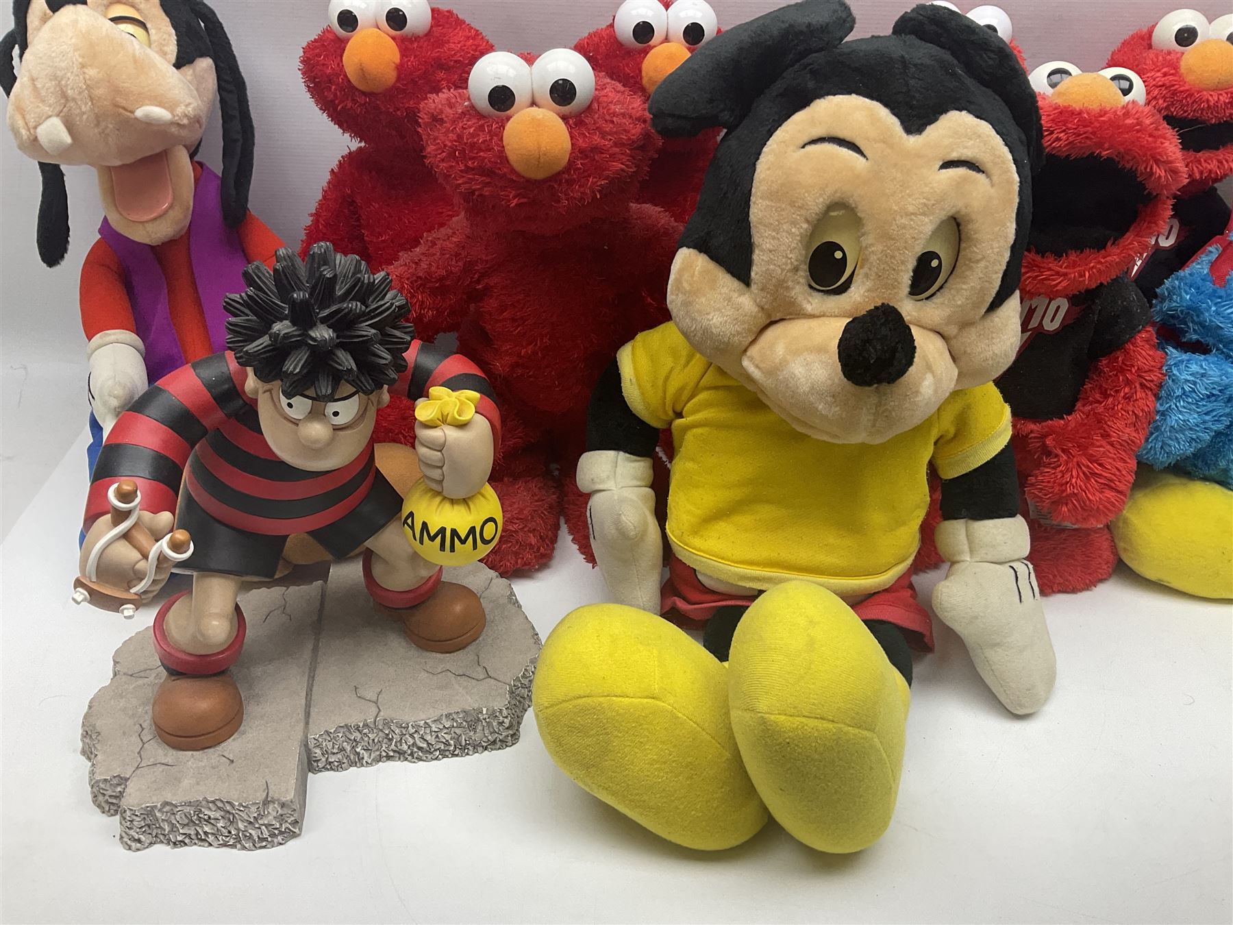 Collection of Sesame Street Elmo, together with Teletubbies and Disney toys etc in two boxes