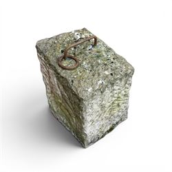 19th century carved tethering stone, square sloping form with iron work loop