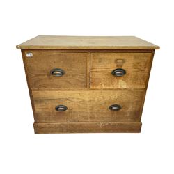 Early to mid-20th century oak chest, fitted with two short drawers over one long drawer, raised on plinth base