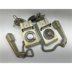 German bakelite morse code key marked 'Entstort' and 'D.R.P. Junker' L15cm; another bearing plaque 'N.S. No.5805-99-580-8558 KEY TELEGRAPH Ser. No. PES597 1973'; and two 1970s turn-dial Trimphones (4)