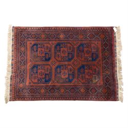 South East Persian Afshar hand-knotted rug, red ground decorated with a geometric design o...