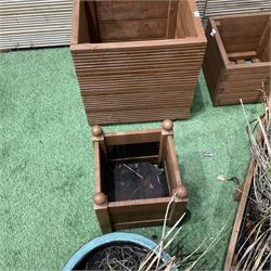 Three glazed circular garden pots, wooden wheel barrow and square planters (9) - THIS LOT IS TO BE COLLECTED BY APPOINTMENT FROM DUGGLEBY STORAGE, GREAT HILL, EASTFIELD, SCARBOROUGH, YO11 3TX
