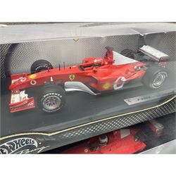 Five Mattel Hot Wheels 1:18 scale die-cast racing cars - Ferrari F1-2000 Michael Schumacher; Ferrari F-2002 Michael Schumacher; Jordan E-110 Heinz-Harald Frentzen; Williams F1 Team FW23Juan Pablo Montoya; and Ferrari F2001 Rubens Barrichello; all boxed (5)
