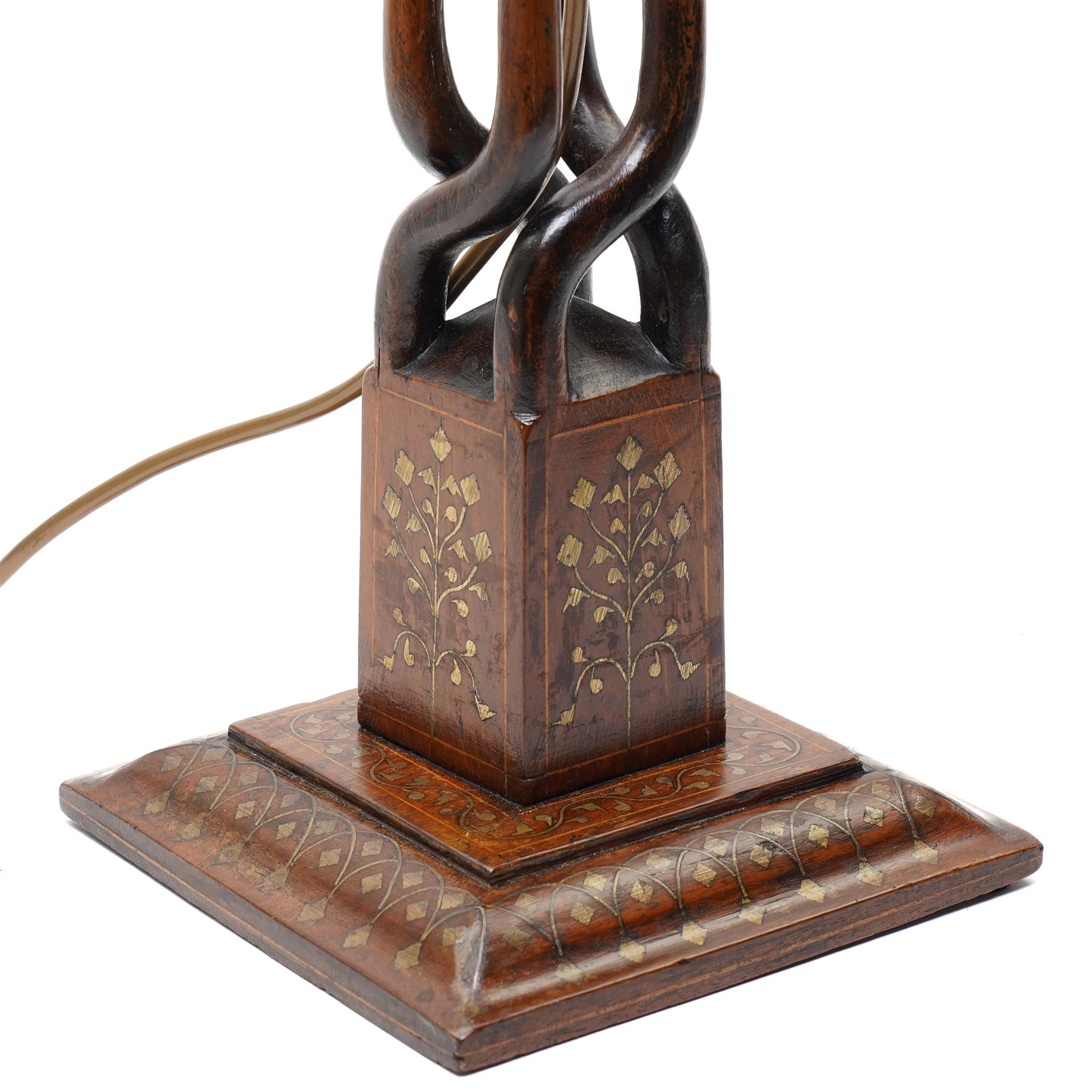 Early 20th century Arts and Crafts style Anglo-Indian table lamp, with open twist stem and gilt brass inlaid trailing vine and repeating arch pattern overall H53cm