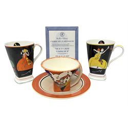 Two limited edition Bradford Exhange Clarice Cliff Age of Jazz beakers, no 289/4,999, with certificate, in box, together with a Moorland Art Deco Clarice Cliff style Huntley Cottage pattern teacup and saucer 